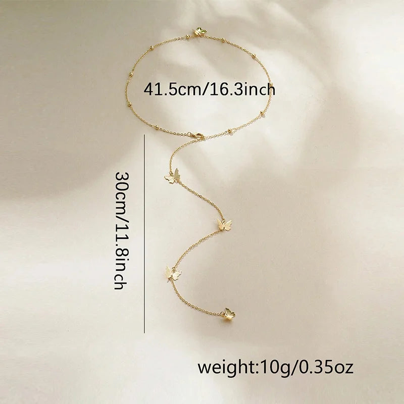 Collier papillon à dos nu